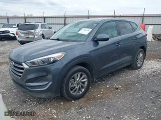 2017 Hyundai Tucson SE with VIN KM8J23A45HU593761, listed as a IAAI auction lot 41885334 with 198,658 mi miles. Bid and sale history available at carsss.com. Image 2.
