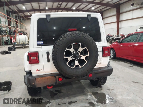 2021 Jeep Wrangler Unlimited Rubicon with VIN 1C4HJXFN2MW809904, listed as a IAAI auction lot 41567956 with 34,000 mi miles and . Bid and sale history available at DreamBid. Image 16.