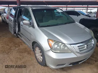 2009 Honda Odyssey LX with VIN 5FNRL38289B049418, listed as a IAAI auction lot 41777253 with 151,512 mi miles and . Bid and sale history available at DreamBid. Image 1.