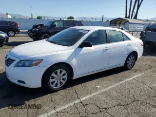 2007 Toyota Camry with VIN JTNBB46K973010243, listed as a Copart auction lot 56090985 with 409,737 mi miles and Salvage title. Bid and sale history available at DreamBid. Image 1.