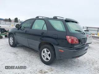 1999 Lexus RX 300 Luxury SUV with VIN JT6HF10U6X0032219, listed as a IAAI auction lot 41582634 with 180,584 mi miles. Bid and sale history available at carsss.com. Image 3.