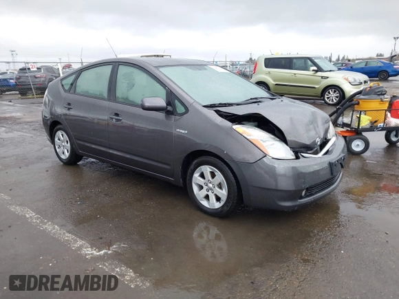 2008 Toyota Prius z VIN JTDKB20U183299560, wystawiony jako IAAI lot #41805405 z przebiegiem 131 160 mil mil oraz . Historia ofert i sprzedaży dostępna na DreamBid. Obrazek 1.