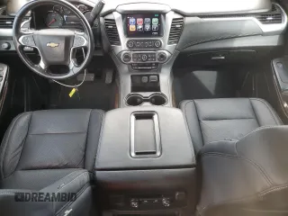 2019 Chevrolet Suburban LS z VIN 1GNSCGKC2KR297407, wystawiony jako Copart lot #75224194 z przebiegiem 93 562 mil mil oraz Szkoda całkowita • Salvage title. Historia ofert i sprzedaży dostępna na DreamBid. Obrazek 8.