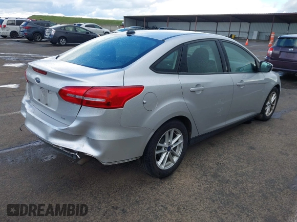 2016 Ford Focus SE with VIN 1FADP3F25GL384296, listed as a IAAI auction lot 41765750 with 158,695 mi miles. Bid and sale history available at carsss.com. Image 4.