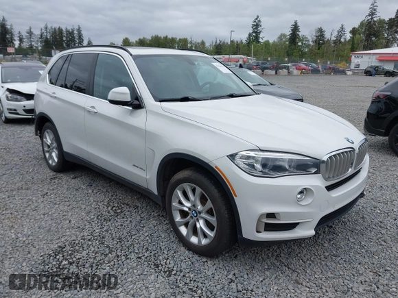 2016 BMW X5 xDrive40e z VIN 5UXKT0C55G0S77047, wystawiony jako IAAI lot #42224623 z przebiegiem 102 611 mil mil oraz . Historia ofert i sprzedaży dostępna na DreamBid. Obrazek 1.