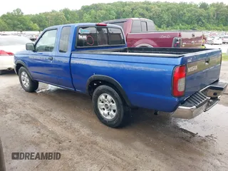 1998 Nissan Frontier XE with VIN 1N6DD26S7WC383868, listed as a IAAI auction lot 42283359 with 98,295 mi miles and . Bid and sale history available at DreamBid. Image 3.