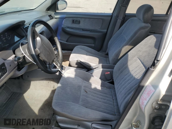 1996 Nissan Sentra XE z VIN 3N1AB41D5TL010573, wystawiony jako Copart lot #47284155 z przebiegiem 158 185 mil mil oraz Szkoda całkowita • Salvage title. Historia ofert i sprzedaży dostępna na DreamBid. Obrazek 7.