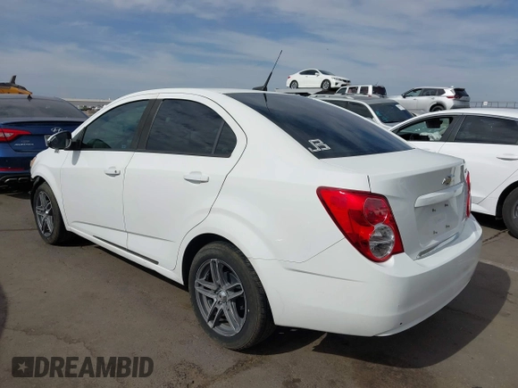 2013 Chevrolet Sonic LS with VIN 1G1JA5SH9D4249356, listed as a IAAI auction lot 42373352 with 151,337 mi miles and . Bid and sale history available at DreamBid. Image 3.