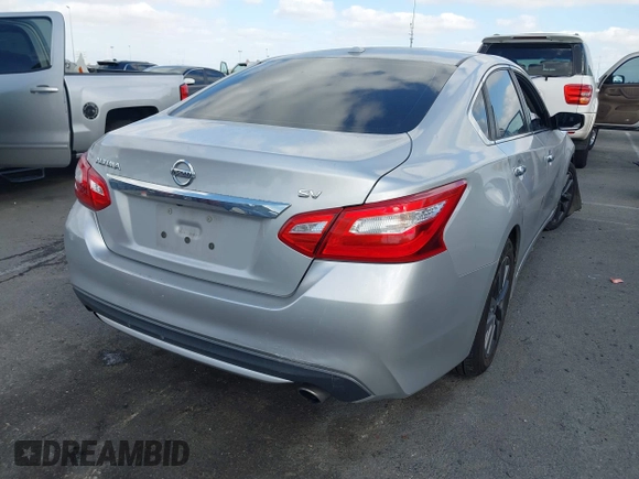 2017 Nissan Altima SV with VIN 1N4AL3AP9HC293762, listed as a IAAI auction lot 41518107 with 118,900 mi miles and . Bid and sale history available at carsss.com. Image 4.