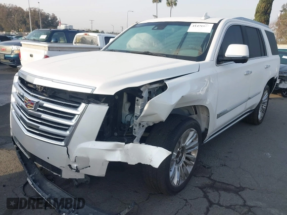 2016 Cadillac Escalade Platinum z VIN 1GYS4DKJ5GR260260, wystawiony jako IAAI lot #41476668 z przebiegiem 108 058 mil mil oraz . Historia ofert i sprzedaży dostępna na DreamBid. Obrazek 18.