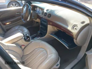 2000 Chrysler LHS with VIN 2C3HC56G4YH222936, listed as a IAAI auction lot 41453912 with 202,102 mi miles. Bid and sale history available at carsss.com. Image 5.