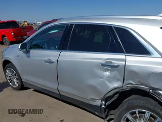 2017 Cadillac XT5 Luxury AWD z VIN 1GYKNDRS1HZ293429, wystawiony jako IAAI lot #42453704 z przebiegiem 92 347 mil mil oraz . Historia ofert i sprzedaży dostępna na DreamBid. Obrazek 14.