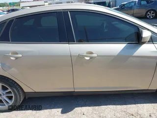 2018 Ford Focus SE z VIN 1FADP3FEXJL210905, wystawiony jako IAAI lot #42264105 z przebiegiem 136 499 mil mil oraz . Historia ofert i sprzedaży dostępna na DreamBid. Obrazek 13.