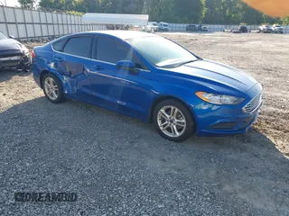 2018 Ford Fusion SE z VIN 3FA6P0H7XJR106776, wystawiony jako IAAI lot #42243361 z przebiegiem 174 000 mil mil oraz . Historia ofert i sprzedaży dostępna na DreamBid. Obrazek 1.