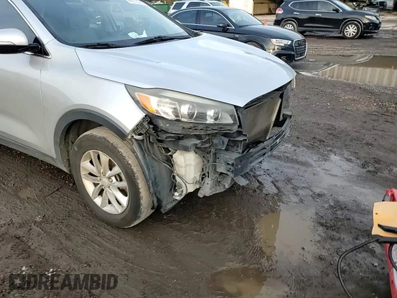 2016 Kia Sorento L with VIN 5XYPG4A30GG014611, listed as a Copart auction lot 41876985 with Not Provided miles and Salvage Title. Bid and sale history available at DreamBid. Image 12.