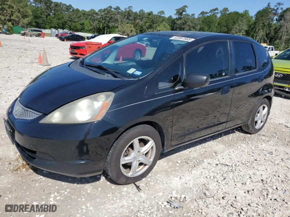 2009 Honda Fit with VIN JHMGE88279S038989, listed as a Copart auction lot 52097985 with 198,427 mi miles and Salvage Title. Bid and sale history available at carsss.com. Image 1.