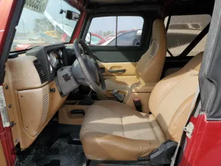 1998 Jeep Wrangler SE with VIN 1J4FY29P0WP792675, listed as a Copart auction lot 76533624 with Not Provided miles and Salvage Title. Bid and sale history available at carsss.com. Image 7.