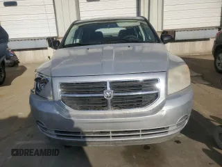 2009 Dodge Caliber SXT z VIN 1B3HB48A59D104136, wystawiony jako Copart lot #45971285 z przebiegiem 291 374 mil mil oraz Szkody całkowita. Historia ofert i sprzedaży dostępna na DreamBid. Obrazek 5.