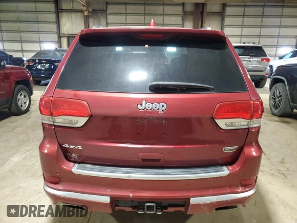 2015 Jeep Grand Cherokee Summit with VIN 1C4RJFJG2FC664245, listed as a Copart auction lot 54131515 with 141,605 mi miles and Salvage Title. Bid and sale history available at DreamBid. Image 6.