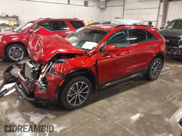 2024 Cadillac XT4 AWD Sport z VIN 1GYFZFR42RF154352, wystawiony jako IAAI lot #41249916 z przebiegiem 27 378 mil mil oraz . Historia ofert i sprzedaży dostępna na DreamBid. Obrazek 2.