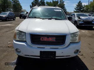 2005 GMC Envoy SLT with VIN 1GKET16M156182653, listed as a Copart auction lot 68747784 with 306,802 mi miles and Salvage Title. Bid and sale history available at DreamBid. Image 5.