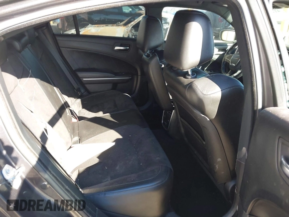 2019 Dodge Charger Scat Pack with VIN 2C3CDXGJ2KH564051, listed as a IAAI auction lot 41255283 with 64,687 mi miles and . Bid and sale history available at DreamBid. Image 8.
