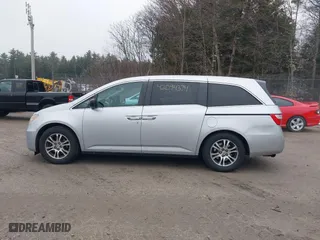 2011 Honda Odyssey EX-L with VIN 5FNRL5H65BB047291, listed as a IAAI auction lot 42094374 with 200,372 mi miles. Bid and sale history available at carsss.com. Image 14.