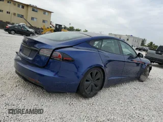 2023 Tesla Model S with VIN 5YJSA1E58PF498685, listed as a Copart auction lot 41690475 with Not provided miles and Salvage title. Bid and sale history available at DreamBid. Image 3.