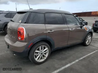 2013 MINI Cooper Countryman with VIN WMWZB3C54DWM09404, listed as a Copart auction lot 54568195 with 126,772 mi miles and Clean Title. Bid and sale history available at carsss.com. Image 3.