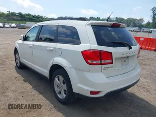 2012 Dodge Journey SXT with VIN 3C4PDDBG3CT307500, listed as a IAAI auction lot 42728446 with 122,072 mi miles and . Bid and sale history available at DreamBid. Image 3.