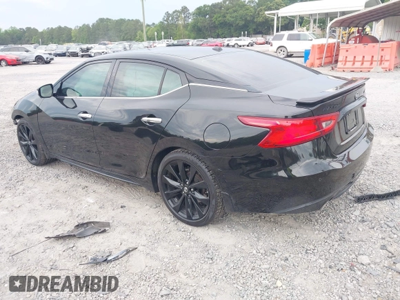 2018 Nissan Maxima Platinum z VIN 1N4AA6AP9JC392479, wystawiony jako IAAI lot #42209148 z przebiegiem 103 710 mil mil oraz . Historia ofert i sprzedaży dostępna na DreamBid. Obrazek 3.
