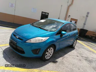 2013 Ford Fiesta SE with VIN 3FADP4EJ0DM202271, listed as a IAAI auction lot 41496985 with 174,624 mi miles. Bid and sale history available at carsss.com. Image 2.