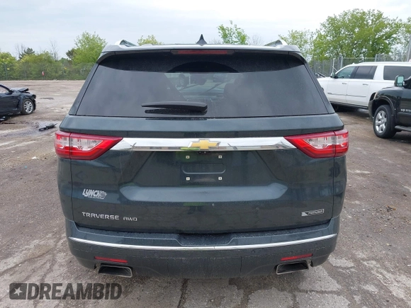 2018 Chevrolet Traverse Premier z VIN 1GNEVJKW4JJ240024, wystawiony jako IAAI lot #42369659 z przebiegiem 160 147 mil mil oraz . Historia ofert i sprzedaży dostępna na DreamBid. Obrazek 17.
