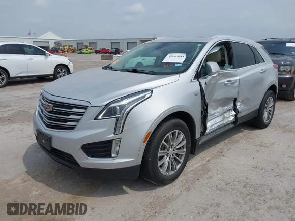 2017 Cadillac XT5 Luxury FWD z VIN 1GYKNBRS0HZ109439, wystawiony jako IAAI lot #42063044 z przebiegiem 79 851 mil mil oraz . Historia ofert i sprzedaży dostępna na DreamBid. Obrazek 17.