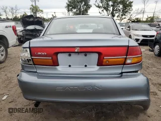 2002 Saturn LS z VIN 1G8JU54F82Y567169, wystawiony jako Copart lot #73280794 z przebiegiem 53 894 mil mil oraz Szkody całkowita. Historia ofert i sprzedaży dostępna na DreamBid. Obrazek 6.