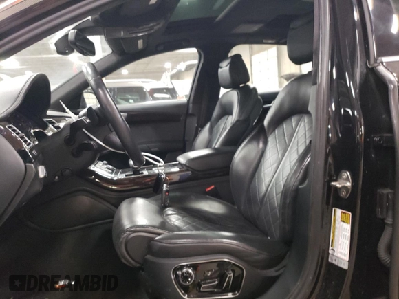 2014 Audi A8 3.0T z VIN WAURGAFD1EN009932, wystawiony jako Copart lot #84607914 z przebiegiem 87 981 mil mil oraz Szkoda całkowita • Salvage title. Historia ofert i sprzedaży dostępna na DreamBid. Obrazek 7.