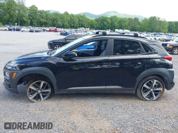 2020 Hyundai Kona Limited z VIN KM8K33A52LU591422, wystawiony jako IAAI lot #42324828 z przebiegiem 59 957 mil mil oraz . Historia ofert i sprzedaży dostępna na DreamBid. Obrazek 14.