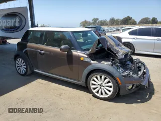 2010 MINI Hardtop with VIN WMWMF3C52ATZ62824, listed as a Copart auction lot 55175395 with 110,585 mi miles and Salvage Title. Bid and sale history available at DreamBid. Image 4.