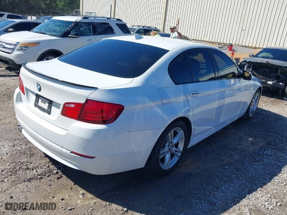 2012 BMW 5 Series 528i with VIN WBAXG5C54CDY28805, listed as a IAAI auction lot 41777043 with 128,056 mi miles. Bid and sale history available at carsss.com. Image 4.