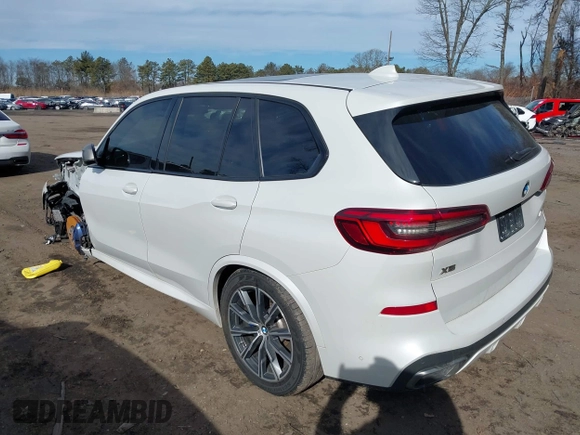 2020 BMW X5 M50i with VIN 5UXJU4C06LLE45651, listed as a IAAI auction lot 41618355 with 70,885 mi miles and . Bid and sale history available at DreamBid. Image 14.