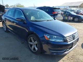 2012 Volkswagen Passat SE with VIN 1VWBP7A32CC026380, listed as a IAAI auction lot 41851980 with 158,784 mi miles. Bid and sale history available at carsss.com. Image 1.