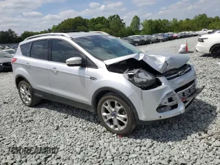 2015 Ford Escape Titanium with VIN 1FMCU9J91FUB46181, listed as a Copart auction lot 54885015 with 100,919 mi miles and Salvage title. Bid and sale history available at DreamBid. Image 4.