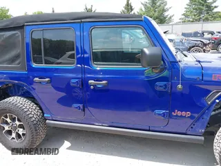 2018 Jeep Wrangler Unlimited Rubicon with VIN 1C4HJXFG8JW184793, listed as a IAAI auction lot 42429098 with 86,580 mi miles and . Bid and sale history available at DreamBid. Image 13.
