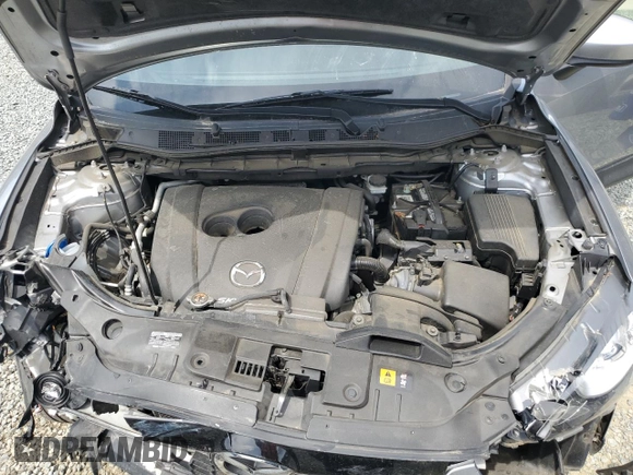 2014 Mazda CX-5 Grand Touring with VIN JM3KE4DY9E0416967, listed as a Copart auction lot 54215285 with 77,296 mi miles and Salvage Title. Bid and sale history available at DreamBid. Image 11.