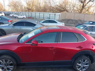 2022 Mazda CX-30 S Carbon Edition с VIN 3MVDMBCL4NM431242, выставлен на аукционе IAAI как лот 41851636 с пробегом 40 982 миль миль и . История ставок и продаж доступна на DreamBid. Изображение 14.