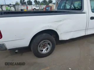 1998 Ford F-150 with VIN 1FTZF1728WKB79405, listed as a IAAI auction lot 41974754 with 278,674 mi miles and . Bid and sale history available at DreamBid. Image 6.