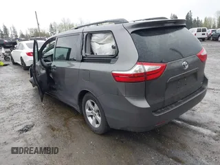 2015 Toyota Sienna LE AAS with VIN 5TDKK3DC3FS635681, listed as a IAAI auction lot 41988400 with 122,669 mi miles and . Bid and sale history available at DreamBid. Image 3.