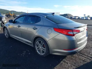 2013 Kia Optima SX w/Limited Pkg with VIN 5XXGR4A67DG191290, listed as a IAAI auction lot 41864684 with 136,525 mi miles. Bid and sale history available at carsss.com. Image 3.