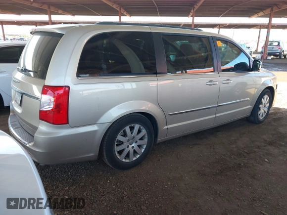 2012 Chrysler Town & Country Touring-L with VIN 2C4RC1CG7CR237270, listed as a IAAI auction lot 41858884 with 187,929 mi miles. Bid and sale history available at carsss.com. Image 4.