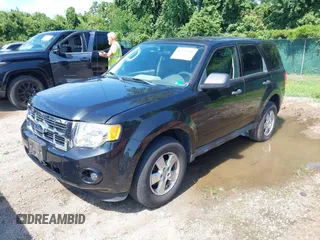 2011 Ford Escape XLS with VIN 1FMCU0C71BKA85329, listed as a IAAI auction lot 42774590 with 226,820 mi miles and . Bid and sale history available at DreamBid. Image 2.